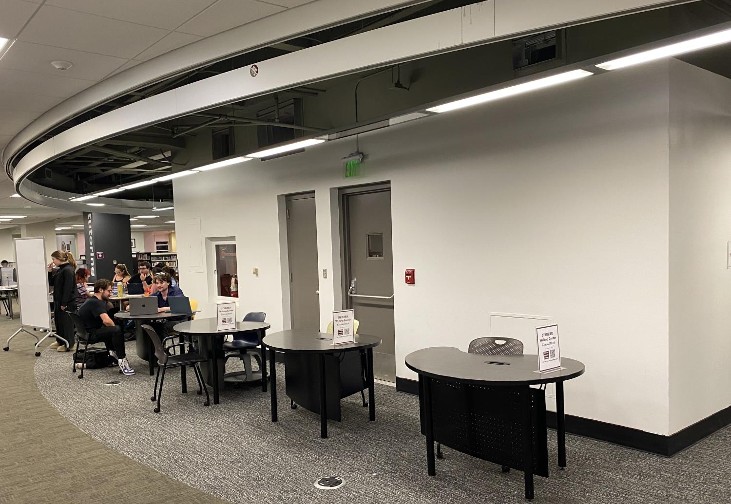 Four small tables at Strozier library