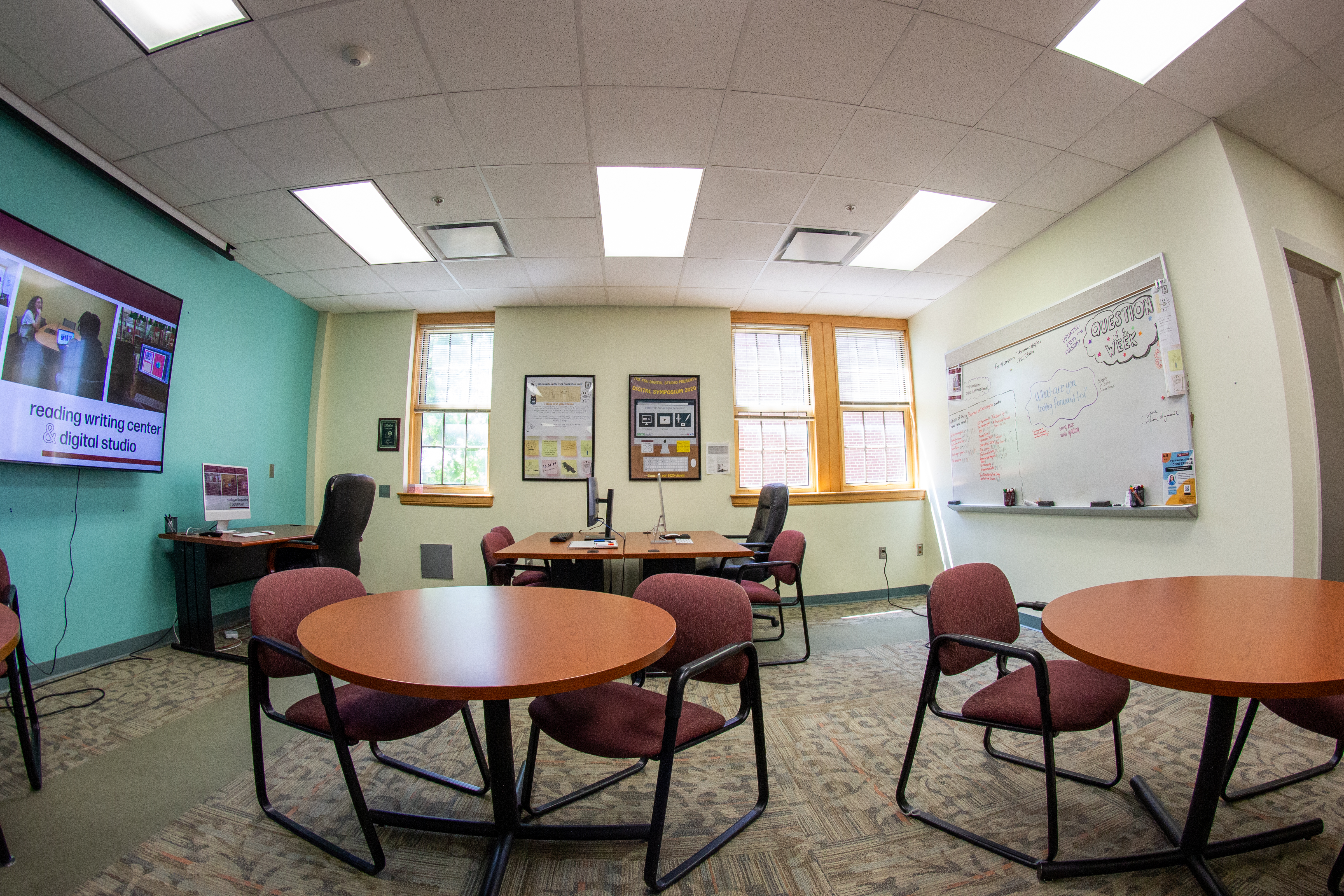 image of Williams Reading-Writing Center location with front desk and meeting tables